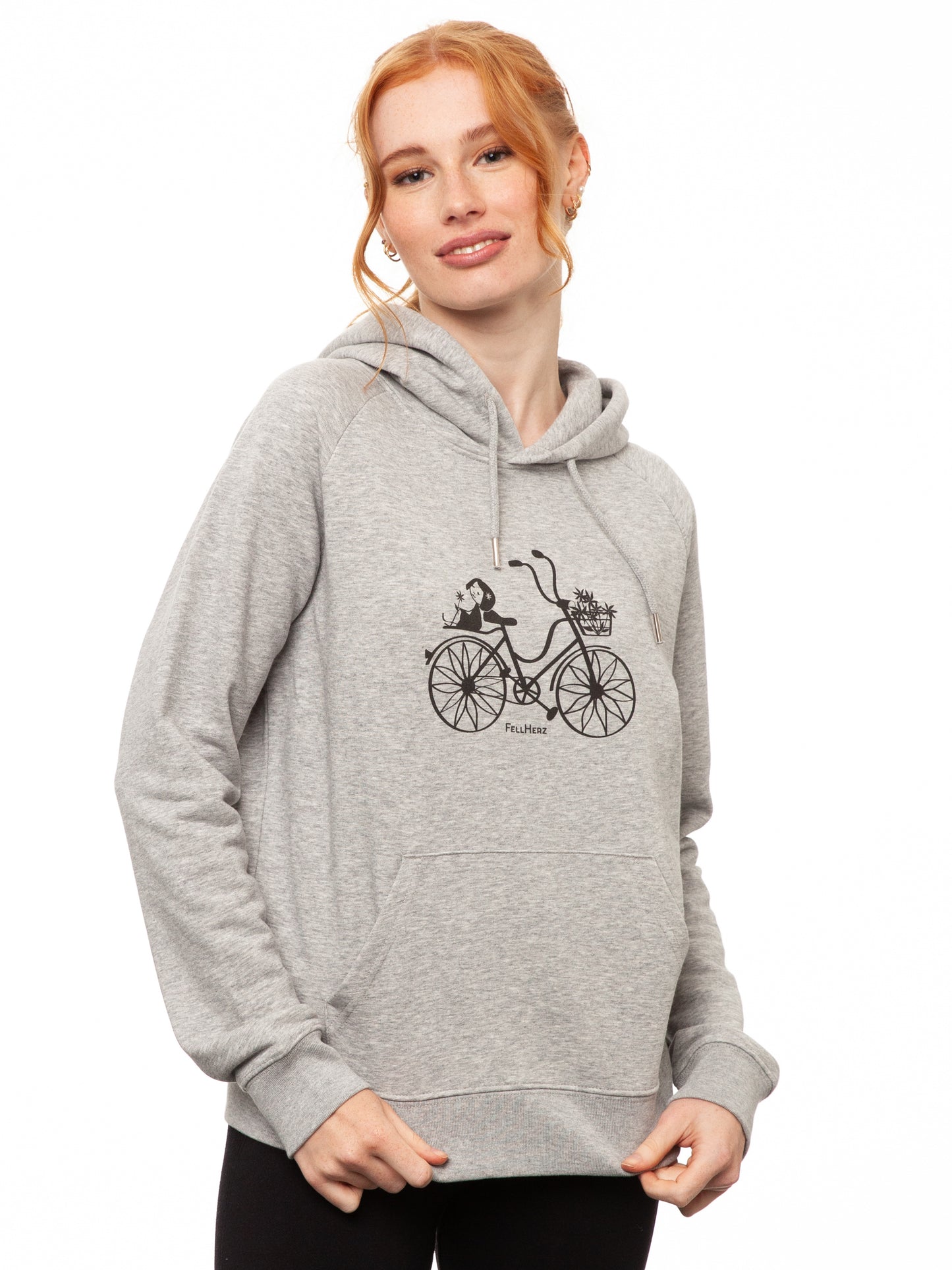 Damen Kapuzen-Pullover in hell grau meliert aus Biobaumwolle, Fair & Vegan hergestellt. Stilvoller Frauen Hoodie mit Känguru-Tasche und nachhaltigem Druck ohne Schadstoffe – Fair Fashion von FellHerz. Der Siebdruck Grafik Print auf der Vorderseite zeigt ein kleines Mädchen mit Blumen auf einem Fahrrad.
